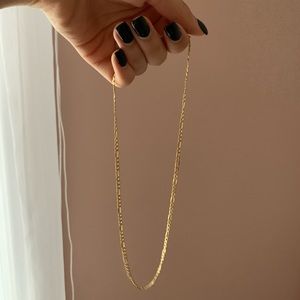 Solid 10k figaro chain